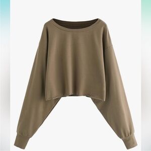 NEW without tags.  Long sleeve crop  . Brown . Size medium.